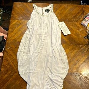 All white “goddess” dress. Perfect for white parties.Mint condition.Size M.Ashro